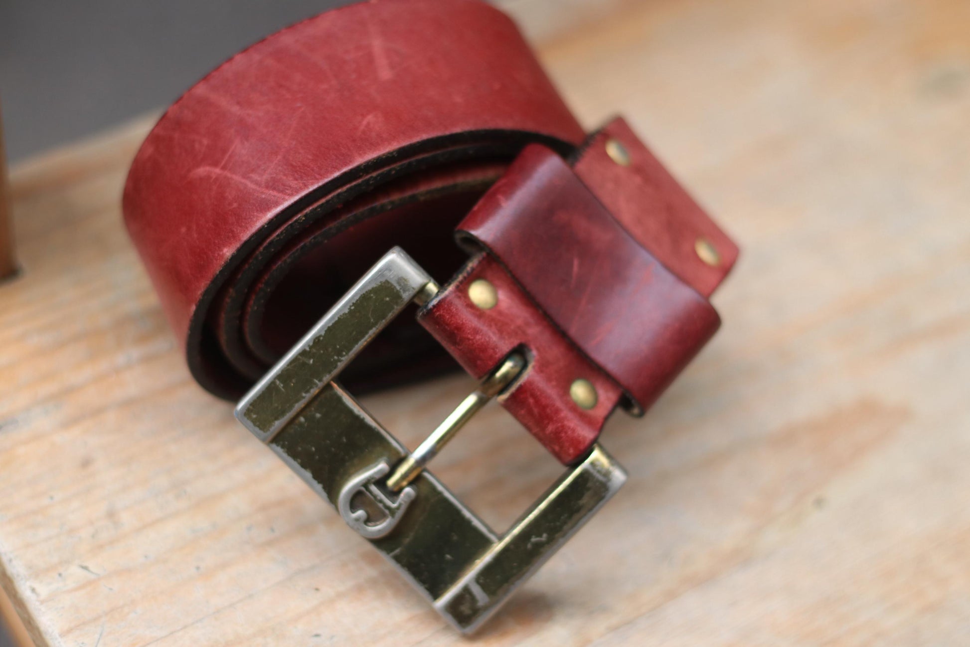 Vintage Aigner Leather Belt| 90s red leather belt with statement buckle